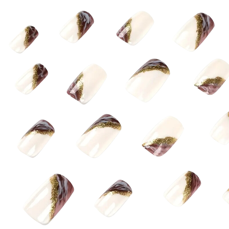 Snazzi Nails Purple Marble Nails set showcases a diagonal array of artificial nails on a white background, featuring a beige base with dark brown, maroon, and gold glitter design. Their glossy finish enhances elegance, displayed in various sizes as DIY full cover nails.
