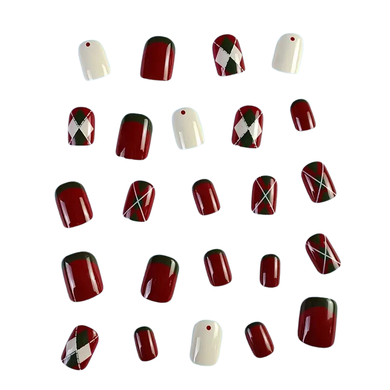 Explore Snazzi Nails Rhomba Nails collection for stunning salon-quality nails at home. Featuring a grid pattern with designs like solid red, red with black tips, and a chic crisscross argyle in red, black, and white—ideal for DIY full cover nail lovers!.