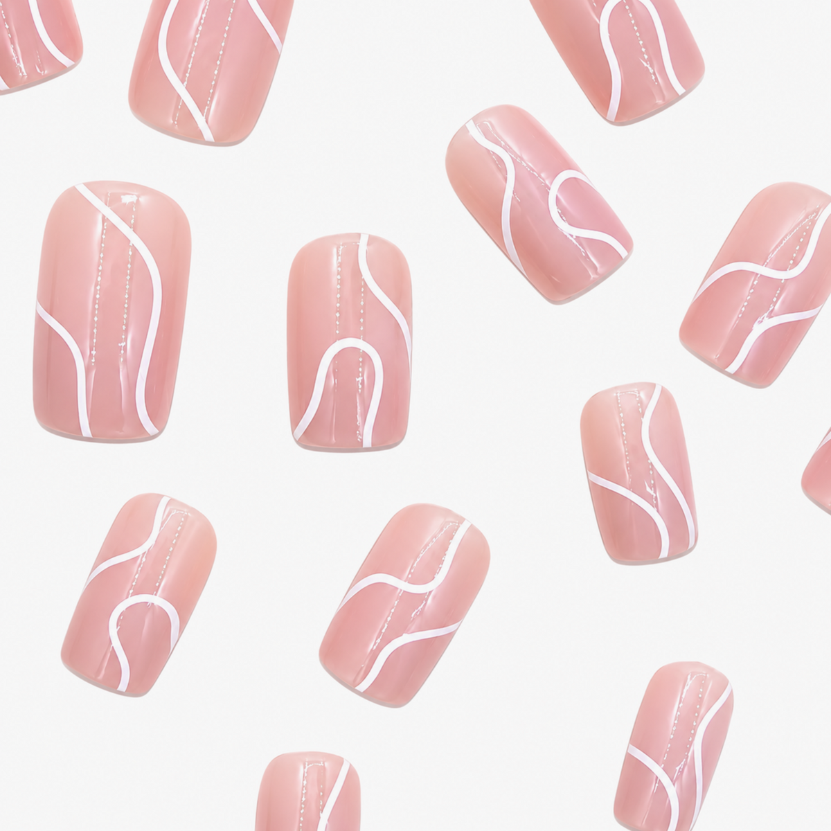 Snazzi Pink Shop Silk Ribbon medium square press-on nails with a blush pink base and elegant white swirl detailing.