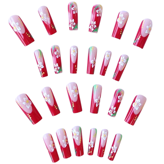 Snazzi Pink Shop extra long square press-on nails with cherry red ombré, white cherry blossoms, and botanical details.