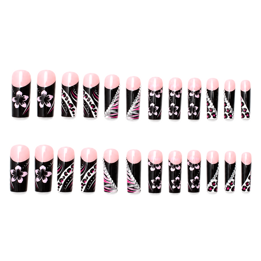 Snazzi Pink Shop extra long square press-on nails featuring glossy black, blush pink floral, and crystal accents.