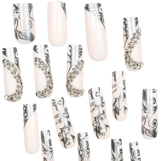 Snazzi Pink Shop Silver Siren extra long coffin press-on nails with metallic silver scrollwork and crystal accents.