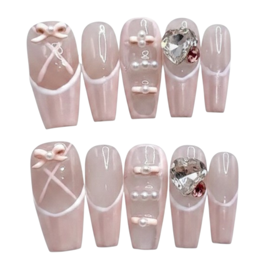 Ballet Crush long coffin handmade nails with pearly pink finish, bows, pearls and heart crystals