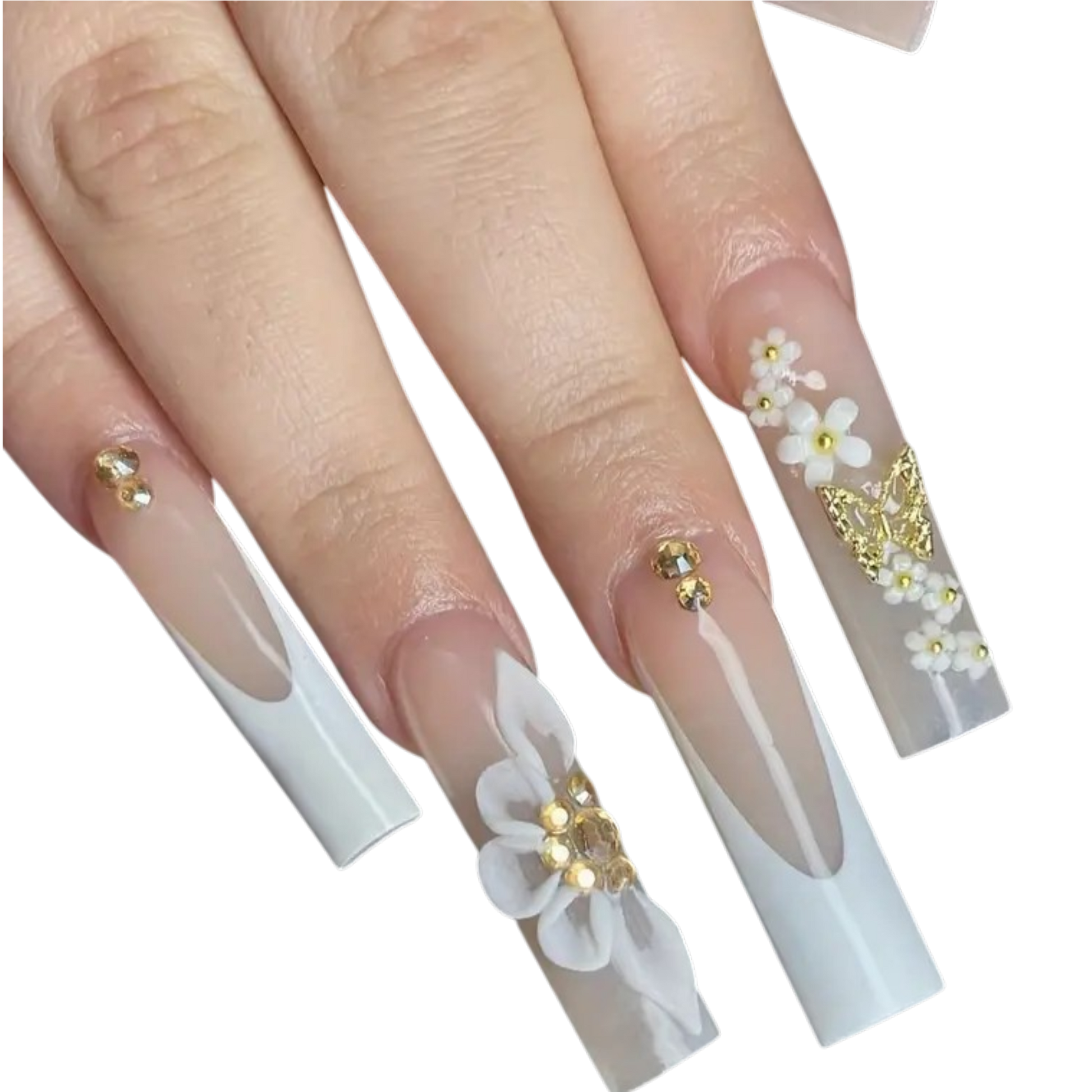 A close-up of a hand showcasing long square press-on nails with a white French tip design, adorned with 3D white flowers, gold glitter accents, and small rhinestone clusters.