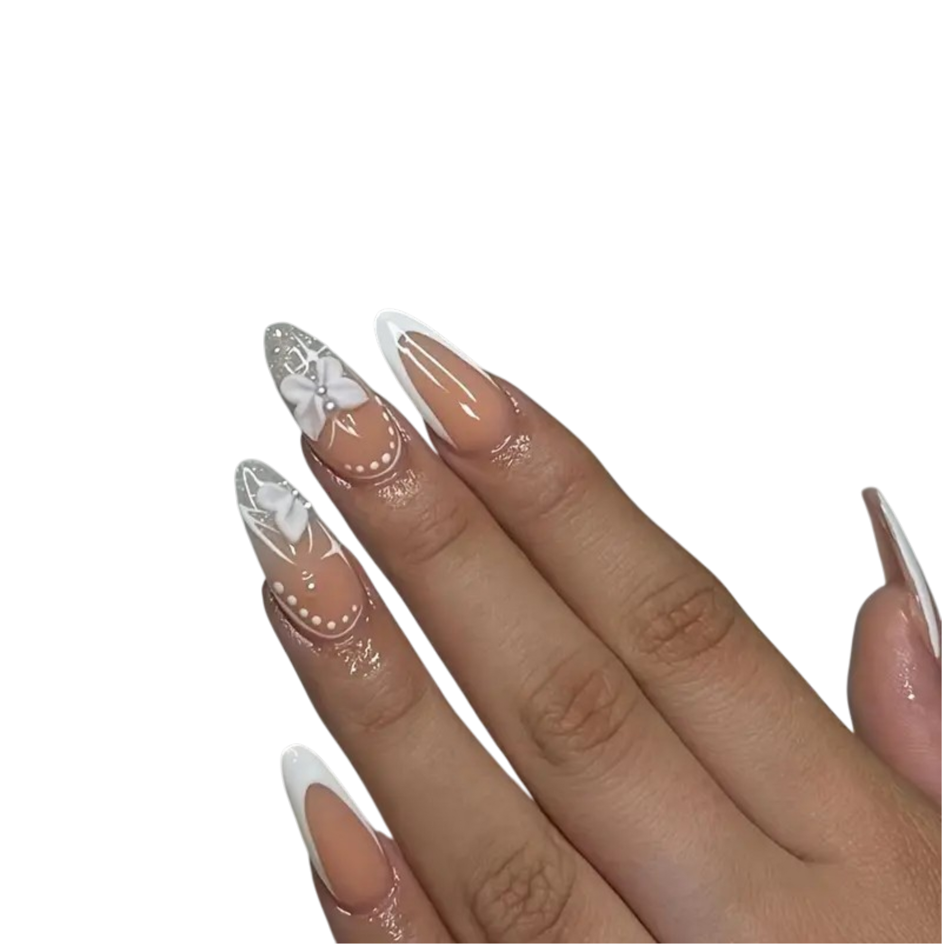 A close-up of a hand displaying long, almond-shaped nails with a glossy nude-beige base and white French tips, decorated with delicate white floral and dot patterns on the top nails.
