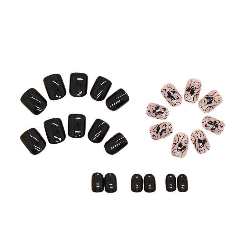 Press on Nails with Black Butterfly Swirl Design laying flat 