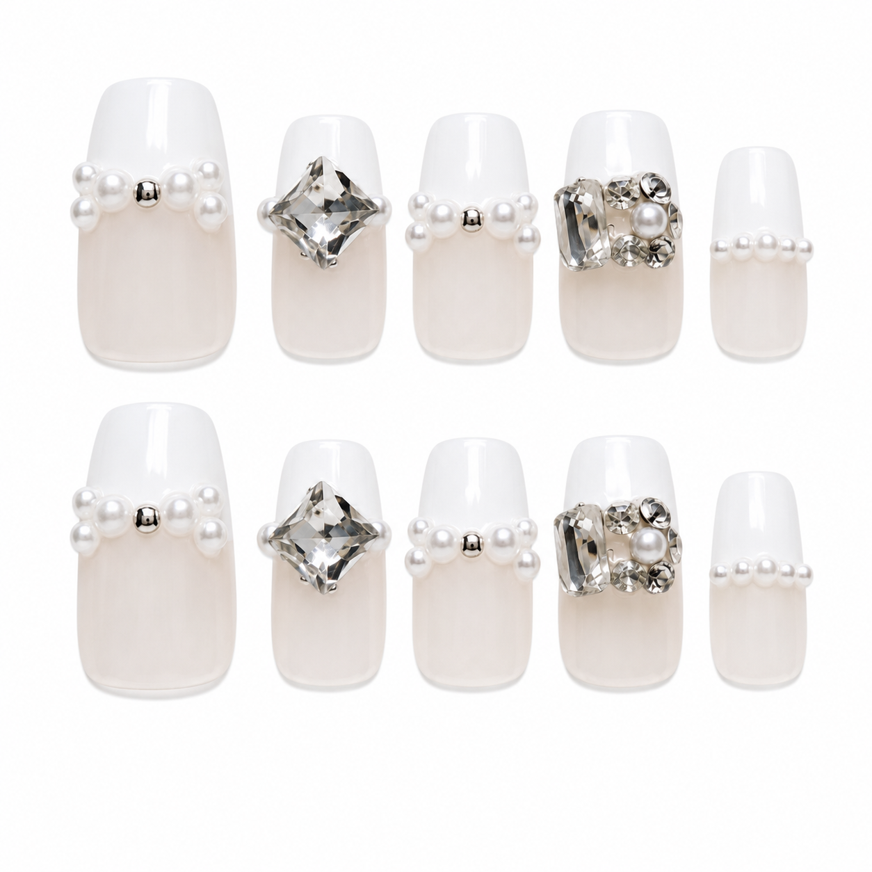 Pearl Poise medium coffin handmade nails with nude bases, white French tips, pearls and clear crystal accents