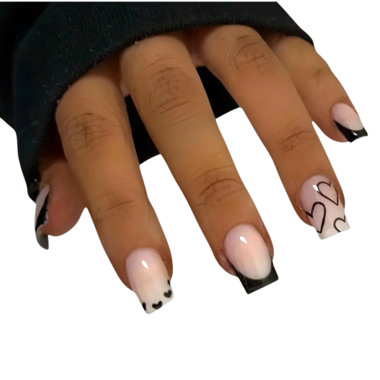 Snazzi Pink Shop Black Ribbon medium square press-on nails with black French tips and romantic heart accent designs.