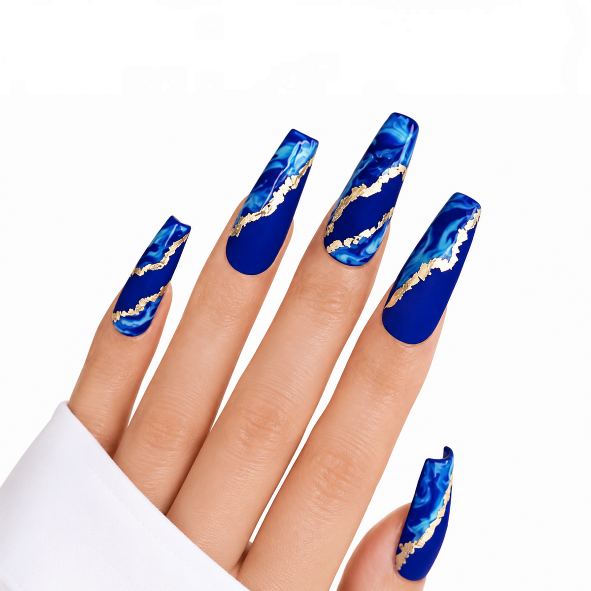 Snazzi Pink Shop extra long coffin press-on nails in matte royal blue with sapphire marble and metallic gold lightning