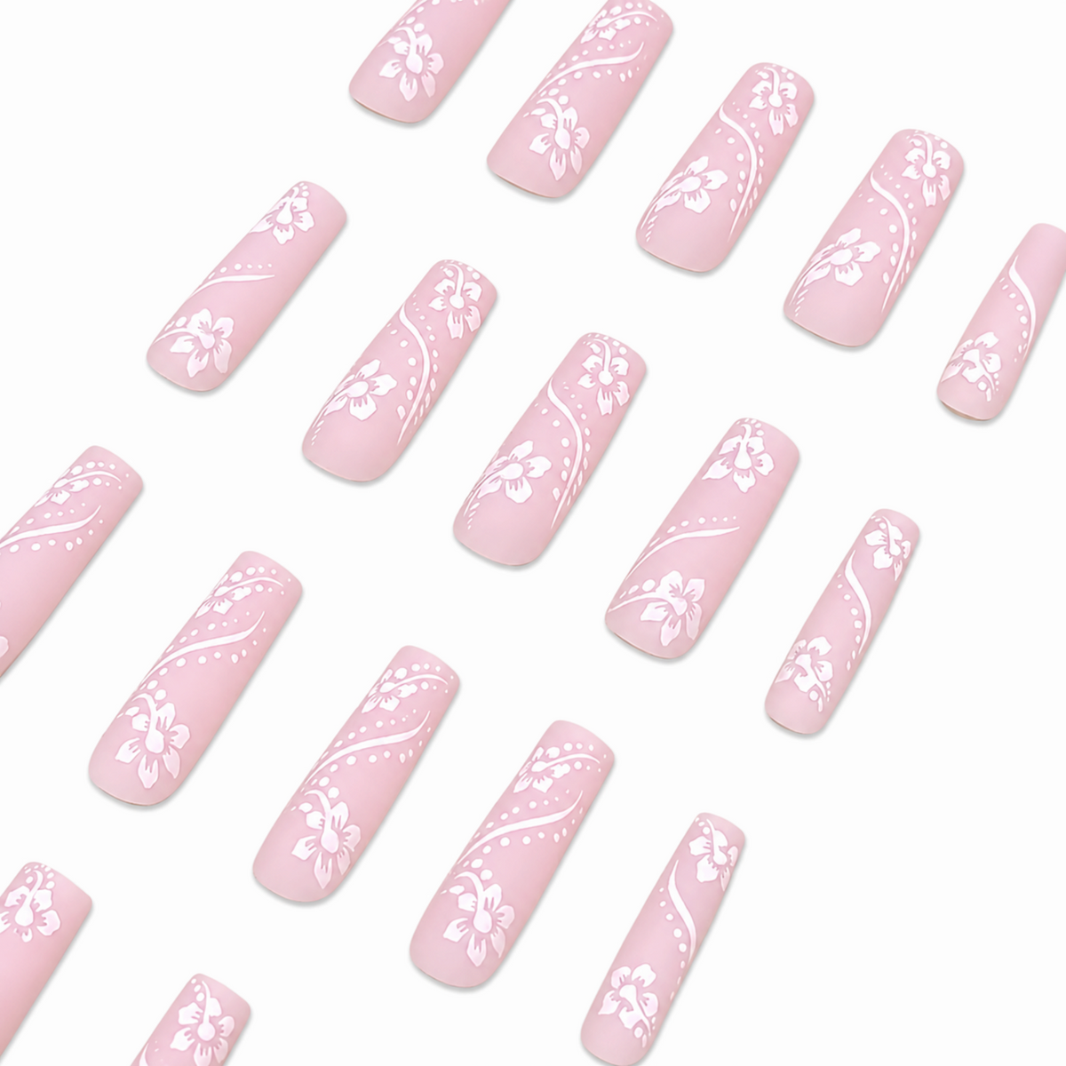 Snazzi Pink Shop extra long square press-on nails in matte blush pink with white floral vine and dot patterns.