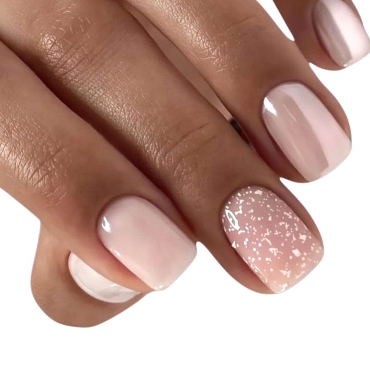 Snazzi Pink Shop Champagne Kiss short squoval press-on nails in blush pink with pearl chrome and glitter accents.