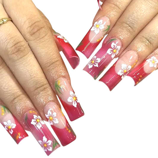 Snazzi Pink Shop extra long square press-on nails with cherry red ombre, white cherry blossoms, and green leaf art.