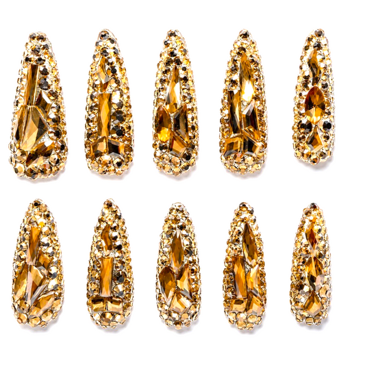 Snazzi Pink Shop Citrine Crown extra long stiletto press-on nails with golden crystals and faceted gemstones.