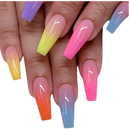 Snazzi Pink Shop extra long coffin press-on nails with a nude base and vibrant multicolor ombré tips in a glossy finish