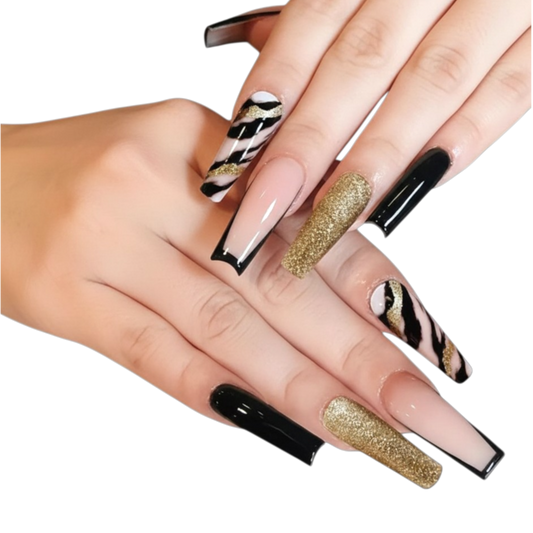 Snazzi Pink Shop extra long coffin press-on nails featuring black, nude, and gold glitter designs with French tips.