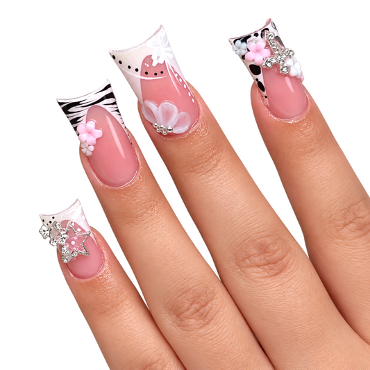 Snazzi Pink Shop Safari Charms medium duckbill press-on nails with animal print, 3D flowers, and silver star charms.