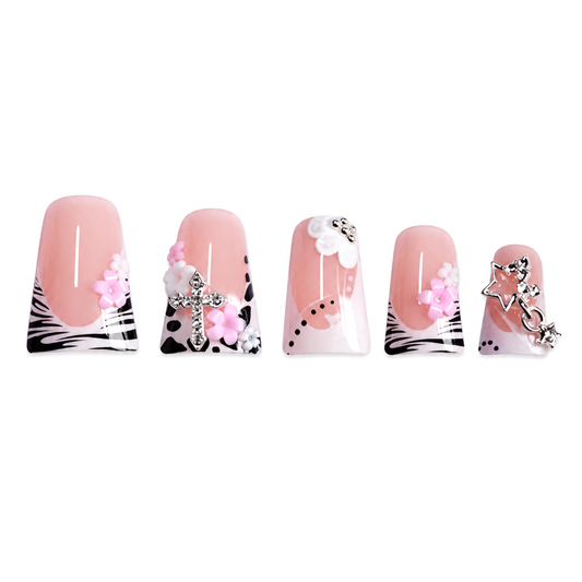 Snazzi Pink Shop Safari Charms medium duckbill press-on nails with animal print, 3D flowers, and silver charms.