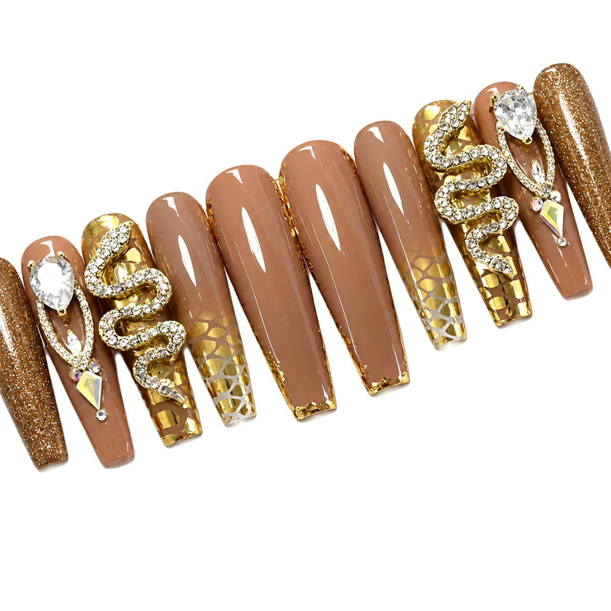 Snazzi Pink Shop Golden Serpent extra-long coffin press-on nails with caramel-nude base, gold charms, and crystals.