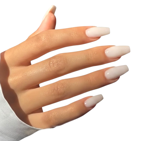 Snazzi Pink Shop long coffin press-on nails in a glossy ivory finish on a hand, showcasing a minimalist chic style.