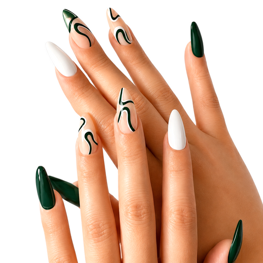 Snazzi Pink Shop Modern Muse long almond press-on nails with nude base, white accents, and dark green abstract swirls.