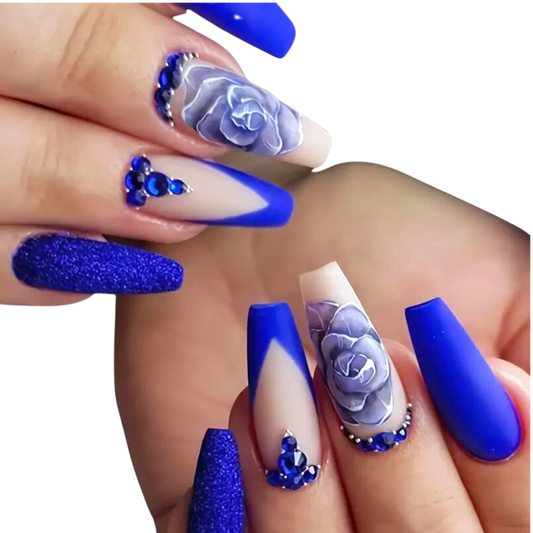 Snazzi Pink Shop long coffin press-on nails in matte royal blue with 3D rose art, sapphire rhinestones, and glitter.