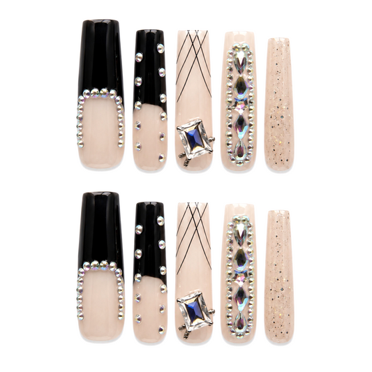 Snazzi Pink Shop Runway Royalty 4XL square nails with nude and black glossy finish, rhinestones, and large gems.