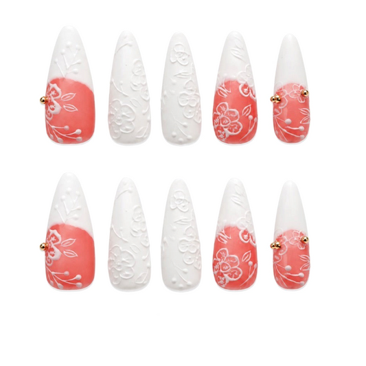 Snazzi Pink Shop Porcelain Petals extra long stiletto nails with matte pink and white floral embossed gold accents